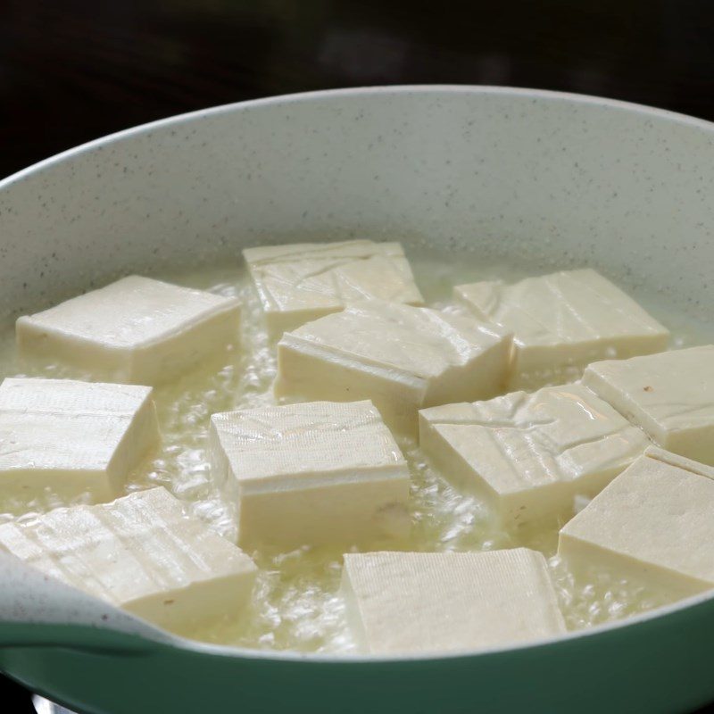 Step 2 Fry the tofu for Quail Eggs with Tofu