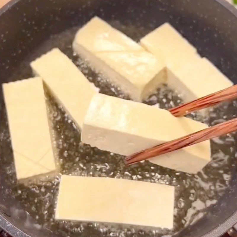 Step 2 Frying Tofu Tofu cooked with galangal and lemongrass