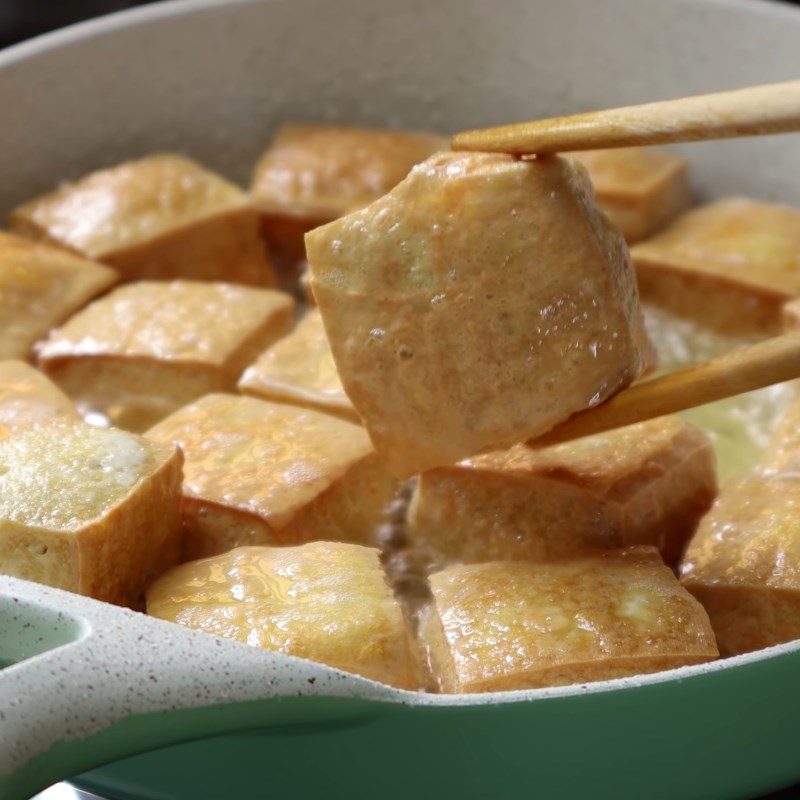 Step 2 Fry the tofu for Quail Eggs with Tofu