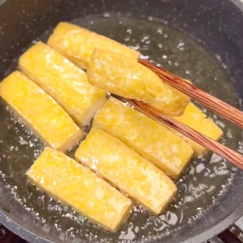 Step 2 Frying Tofu Tofu cooked with galangal and lemongrass