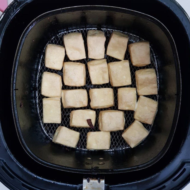 Step 3 Frying tofu Eel with banana and tofu stew