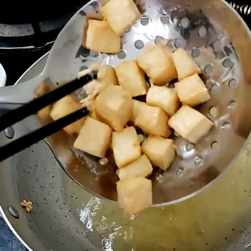 Step 2 Fry the tofu Lotus Seed Tofu Soup