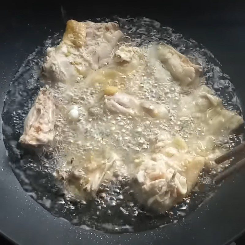 Step 3 Frying chicken with lemongrass and chili