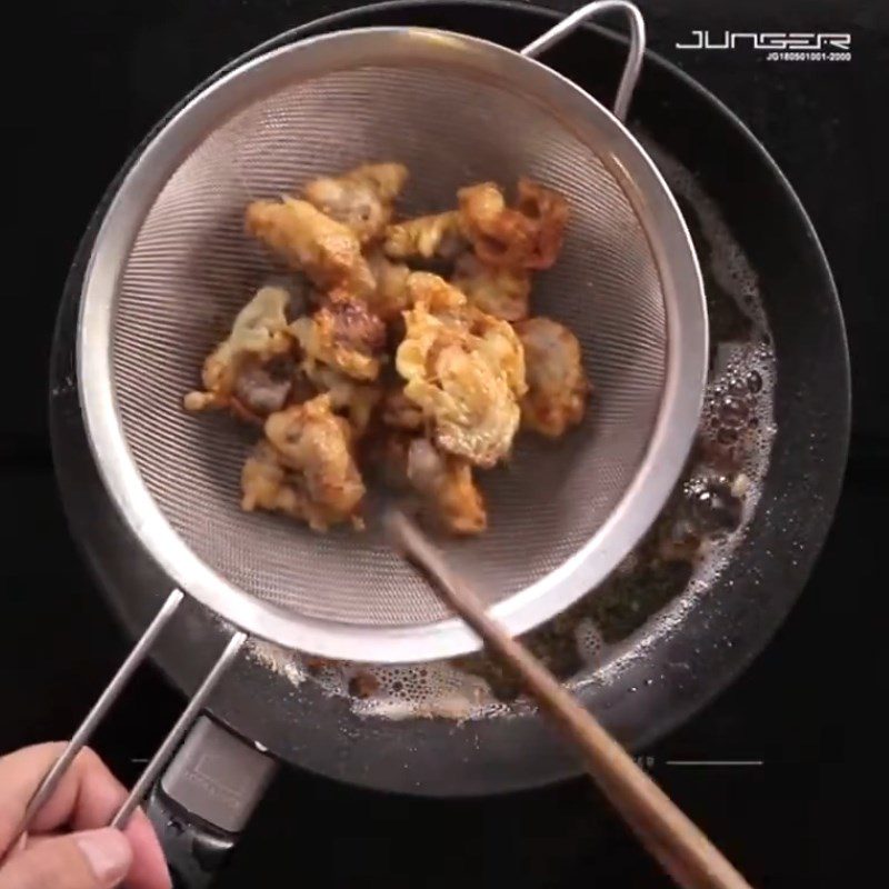 Step 4 Fry fish guts Fried basa fish guts with garlic and chili