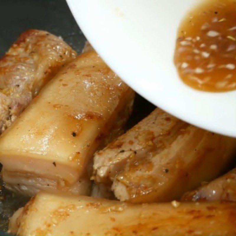 Step 3 Frying meat Braised pork in coconut water