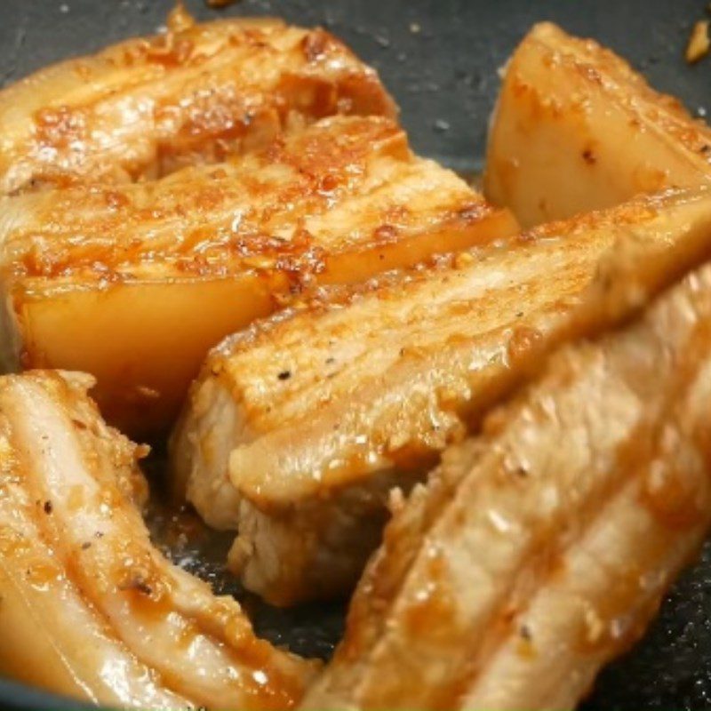 Step 3 Frying meat Braised pork in coconut water