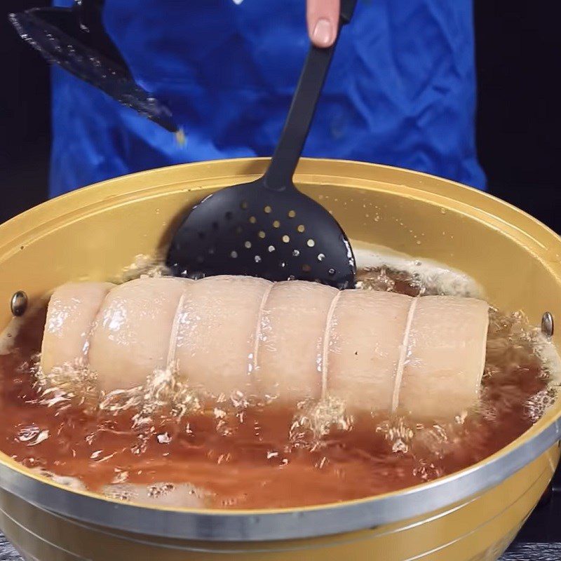 Step 5 Frying meat Crispy rolled pork belly