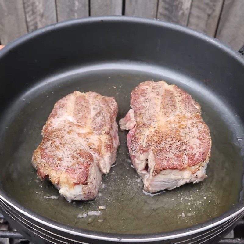 Step 2 Frying pork steak with herbs