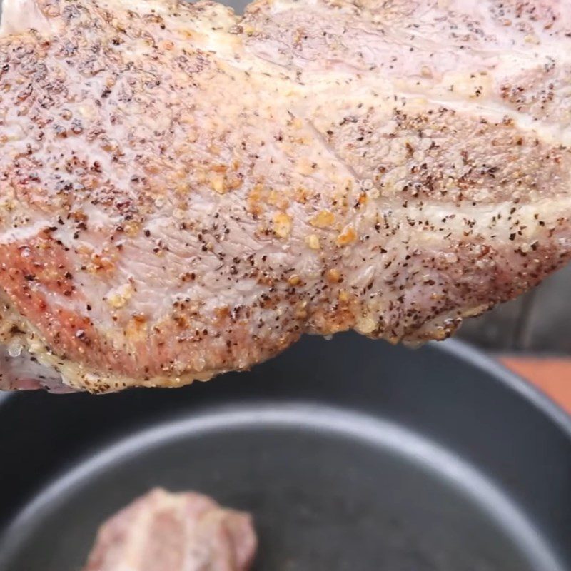 Step 2 Frying pork steak with herbs