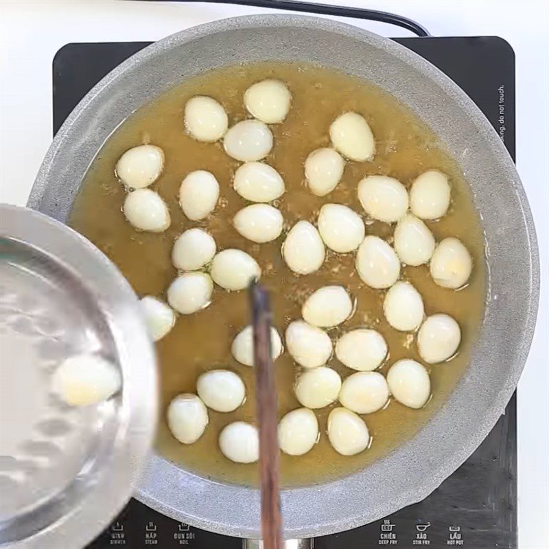 Step 2 Fry quail eggs Fried Quail Eggs with Lemongrass and Chili