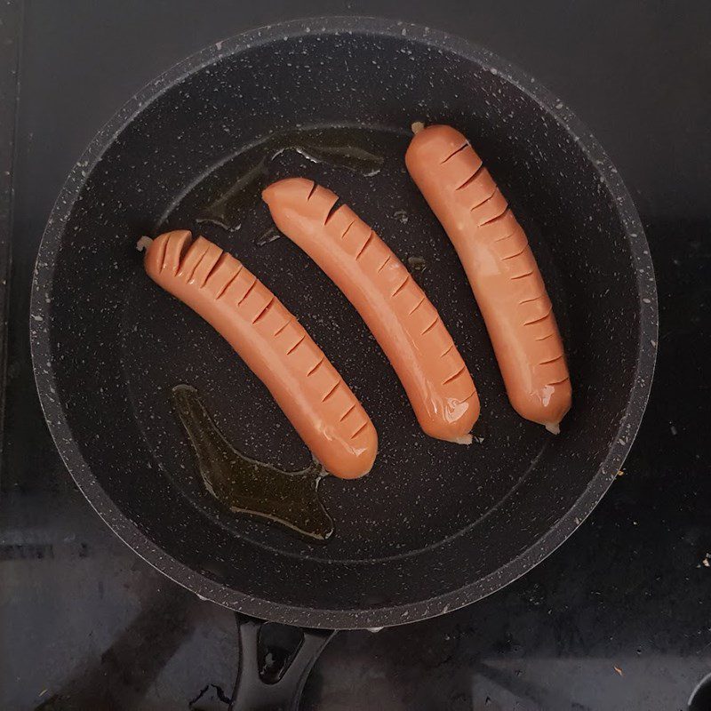 Step 2 Frying sausages Fried garlic butter sausages