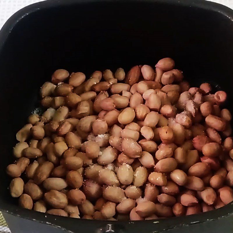 Step 2 Add peanuts to the air fryer Roasted peanuts using an air fryer