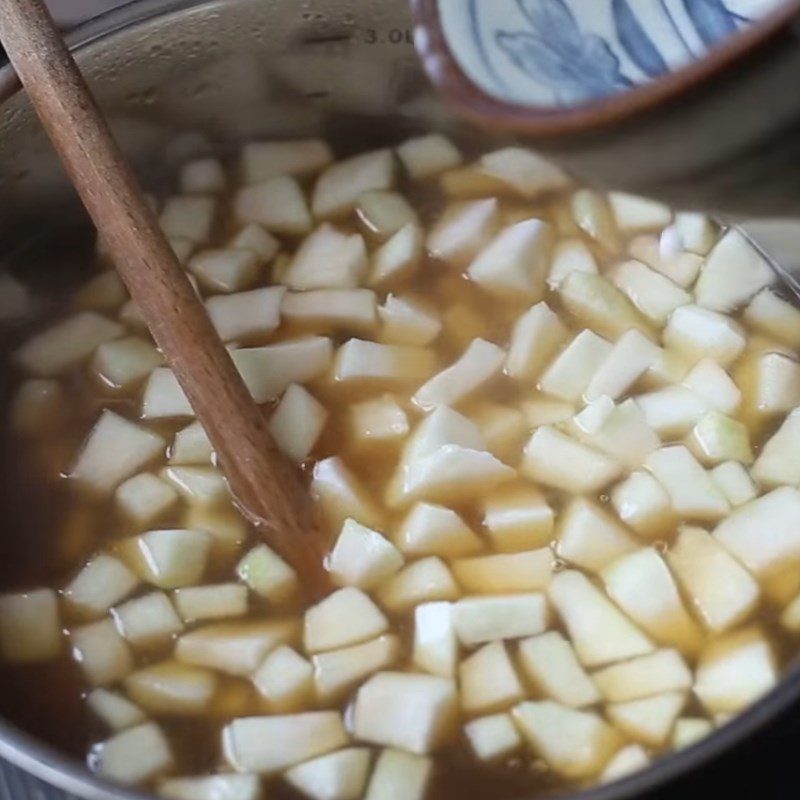 Step 4 Prepare syrup for boiling grapefruit pulp for An Giang grapefruit dessert