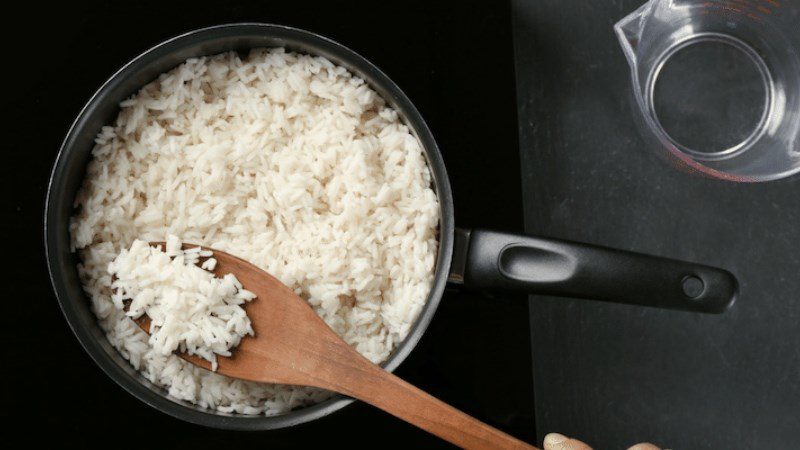 Continue stirring the rice on the stove