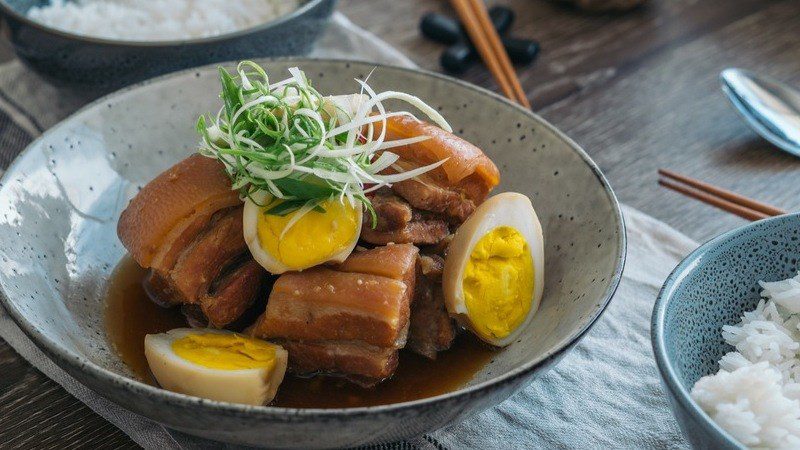 braised pork belly with eggs is an essential dish on Tet meal