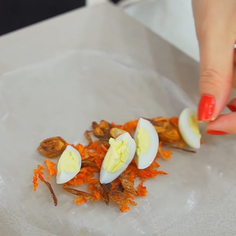 Step 5 Rolling the rice paper for the egg yolk rice paper rolls