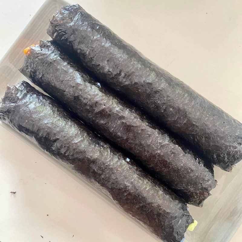 Step 3 Rolling rice Butterfly pea flower rice rolls (recipe shared by users)