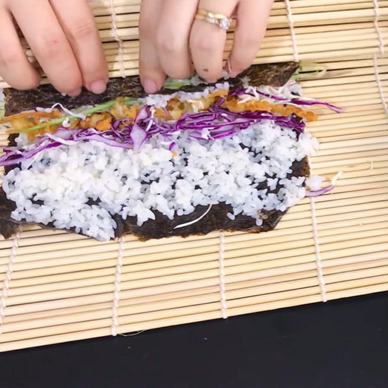 Step 4 Rolling sushi Crab stick cabbage