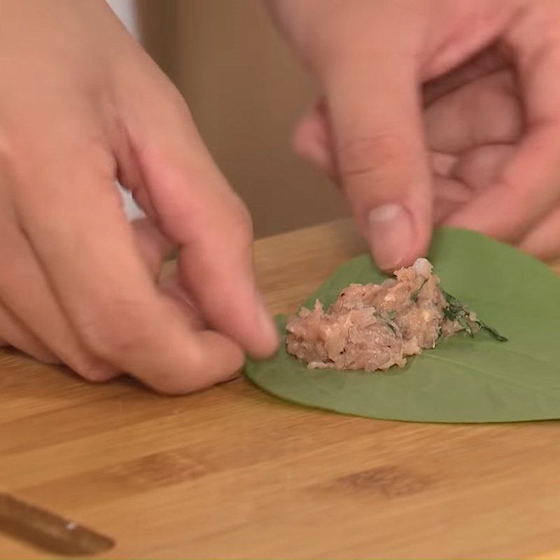 Step 4 Shaping roll Frog wrapped in wild betel leaves