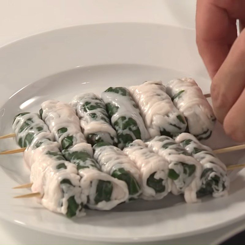 Step 4 Shaping roll Frog wrapped in wild betel leaves