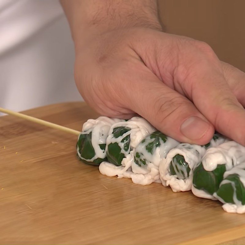 Step 4 Shaping roll Frog wrapped in wild betel leaves