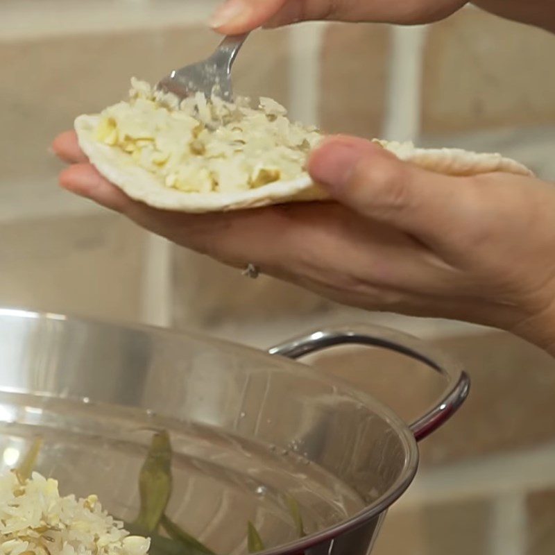 Step 5 Wrapping sticky rice with rice paper and durian Sticky rice roll with durian