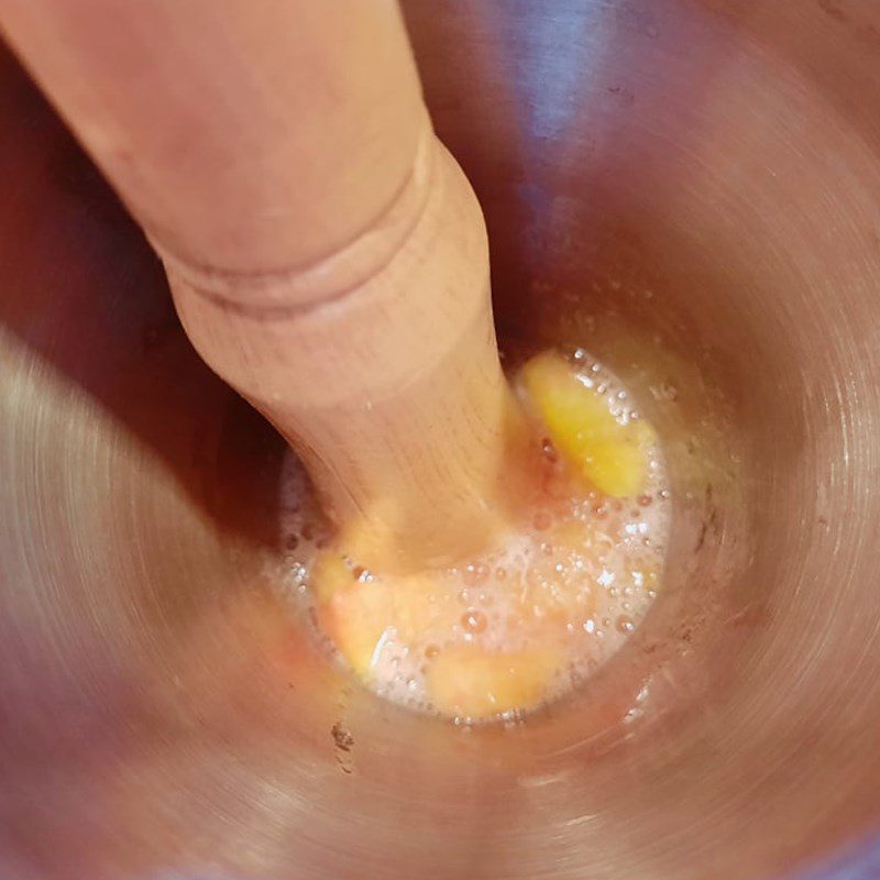 Step 2 Mash the peach for non-alcoholic peach Mojito