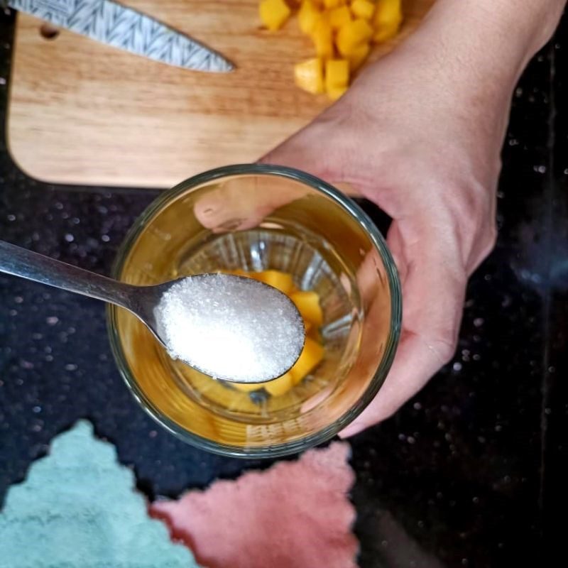 Step 1 Mash the mango Fresh milk mango salad