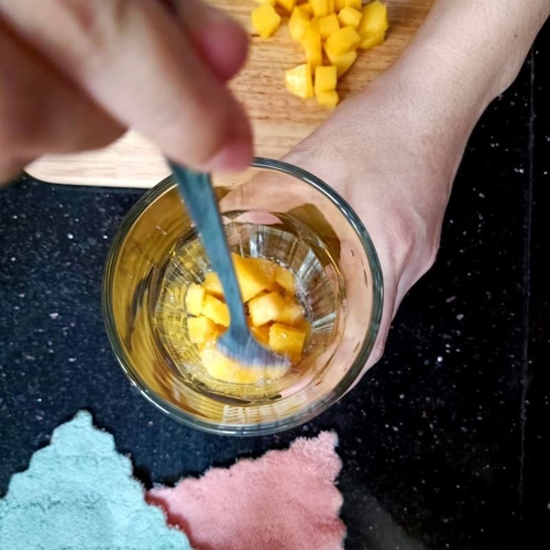 Step 1 Mash the mango Fresh milk mango salad