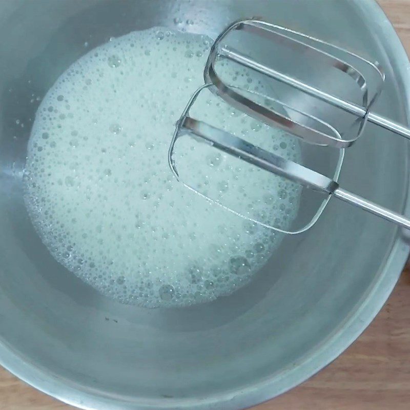 Step 1 Whip the egg whites for Raisin Swiss Roll Cake