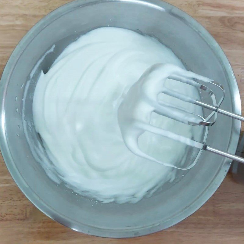 Step 1 Whip the egg whites for Raisin Swiss Roll Cake