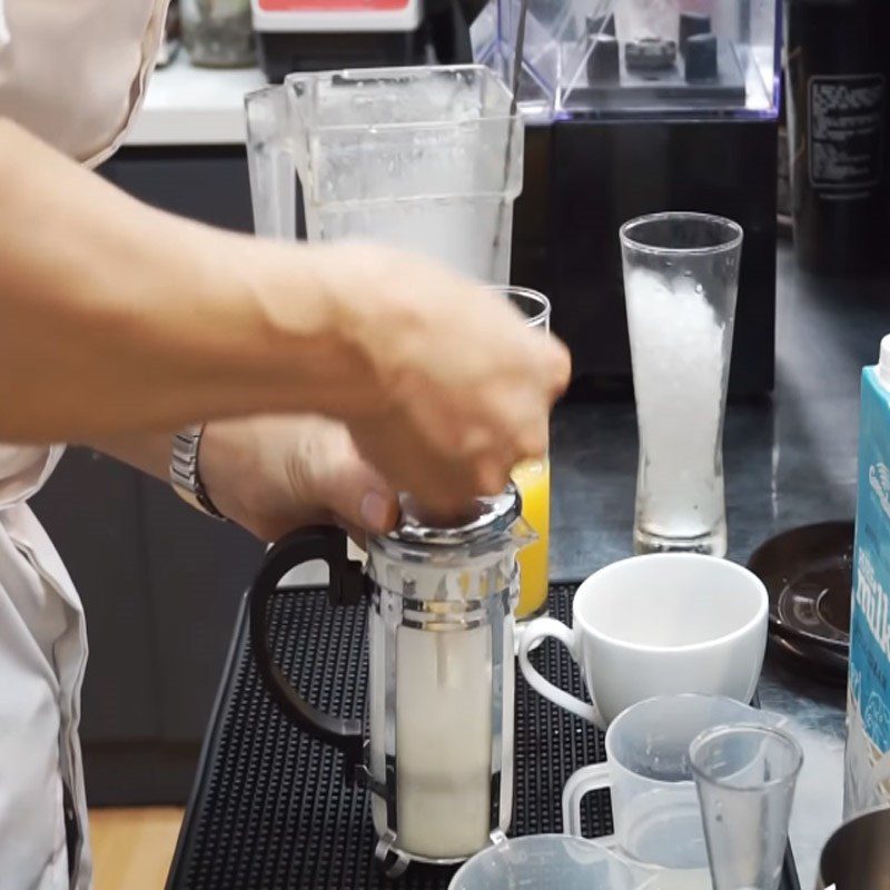 Step 3 Froth the milk for Mango Coffee