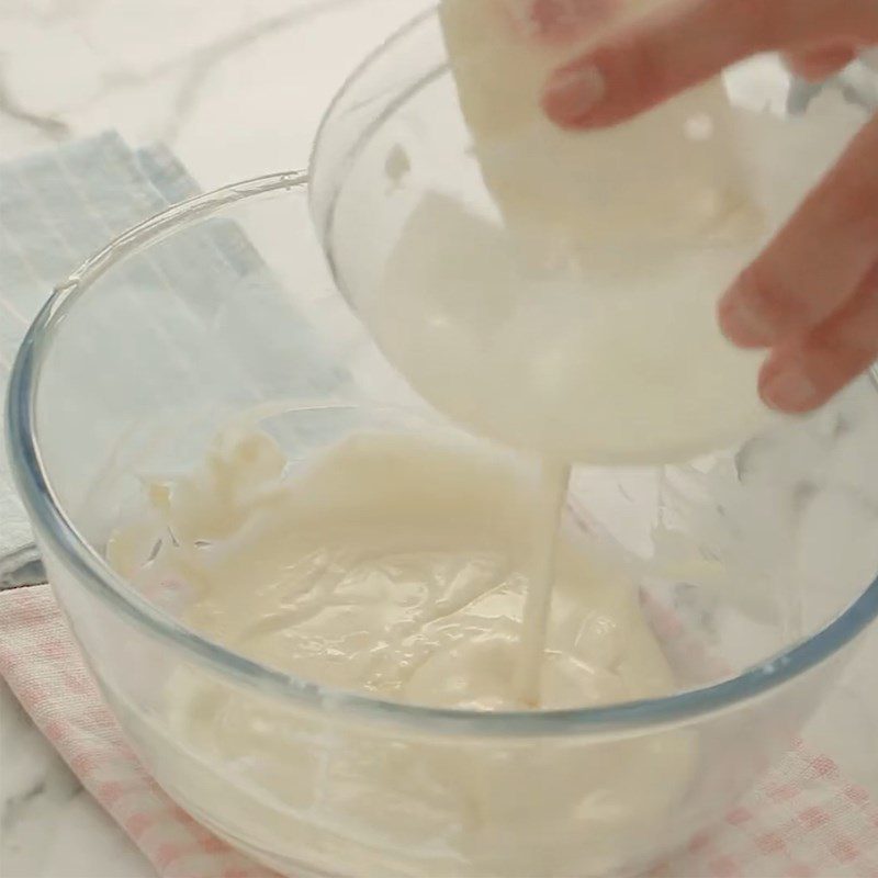 Step 2 Whipping cream cheese for raspberry rose cheesecake