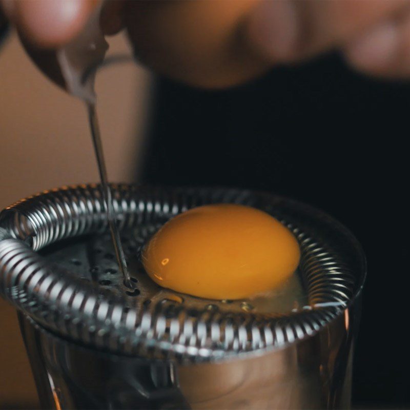 Step 1 Whip the egg whites for Peruvian Pisco Sour