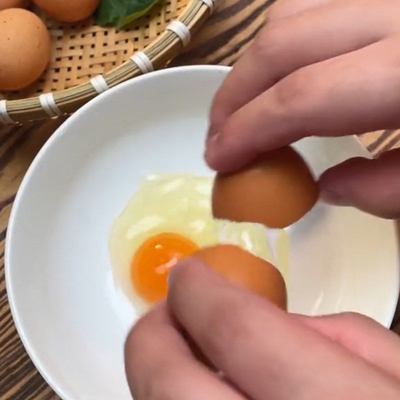 Step 2 Whisk the Eggs for Fried Eggs with Vietnamese Knotweed Leaves (Recipe shared from TikTok Into the Kitchen with TasteVN)