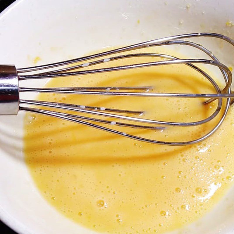 Step 1 Whisking eggs for Oreo Cupcake