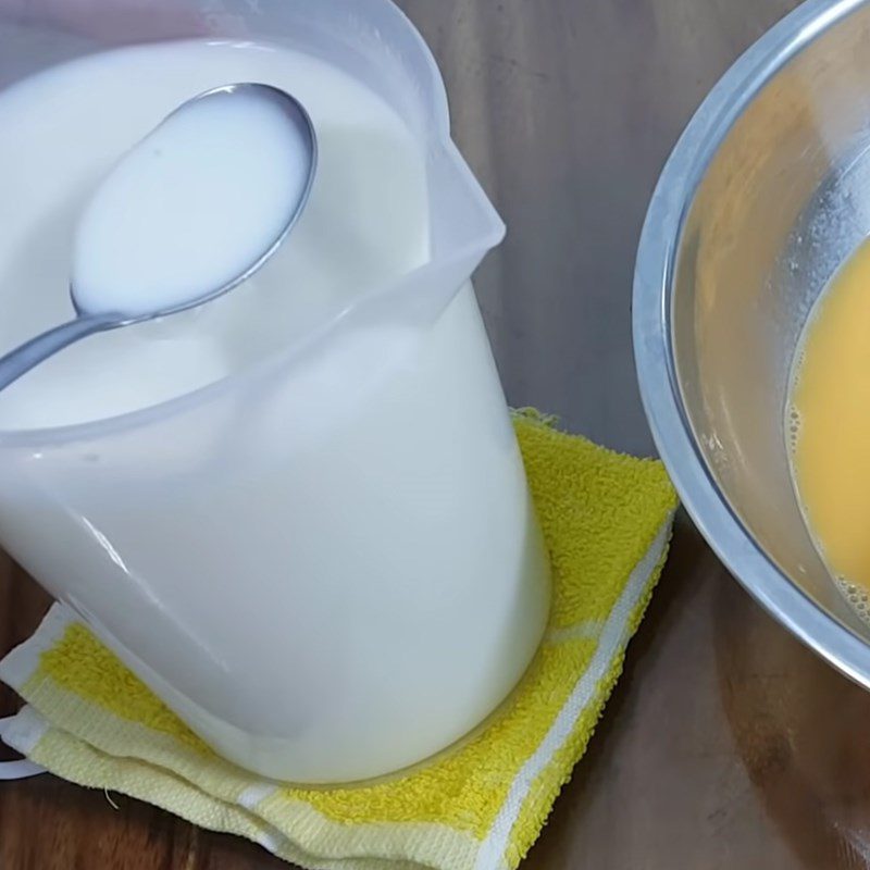 Step 2 Whisking eggs and mixing condensed milk for condensed milk flan