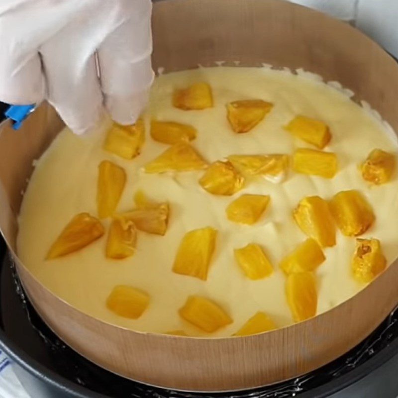 Step 8 Pour into the mold, bake the cake Pineapple cheesecake