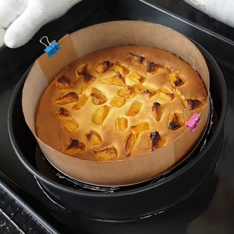 Step 8 Pour into the mold, bake the cake Pineapple cheesecake