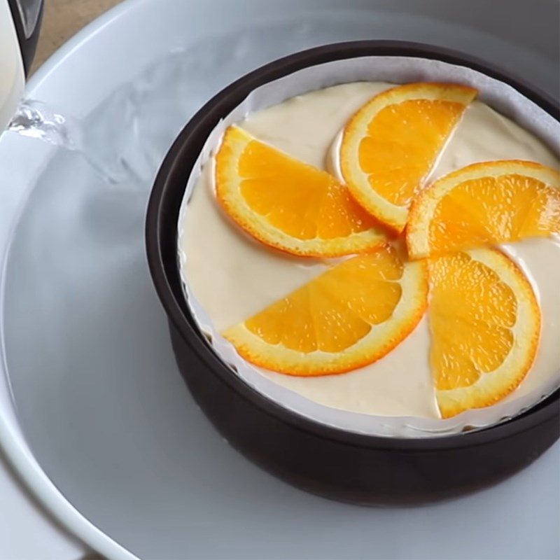 Step 4 Pouring into the mold and baking Orange cheesecake with flour