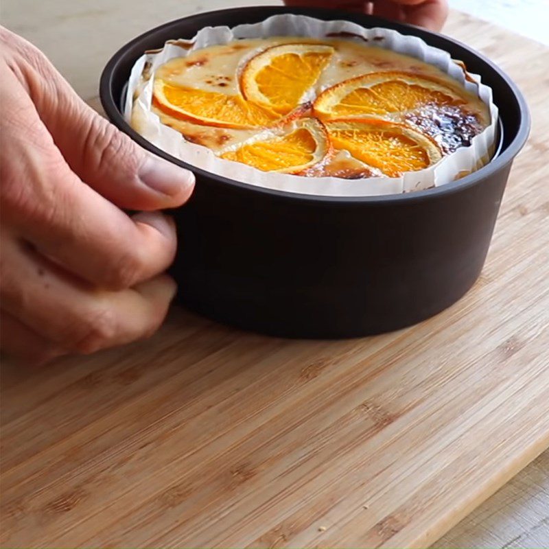 Step 4 Pouring into the mold and baking Orange cheesecake with flour