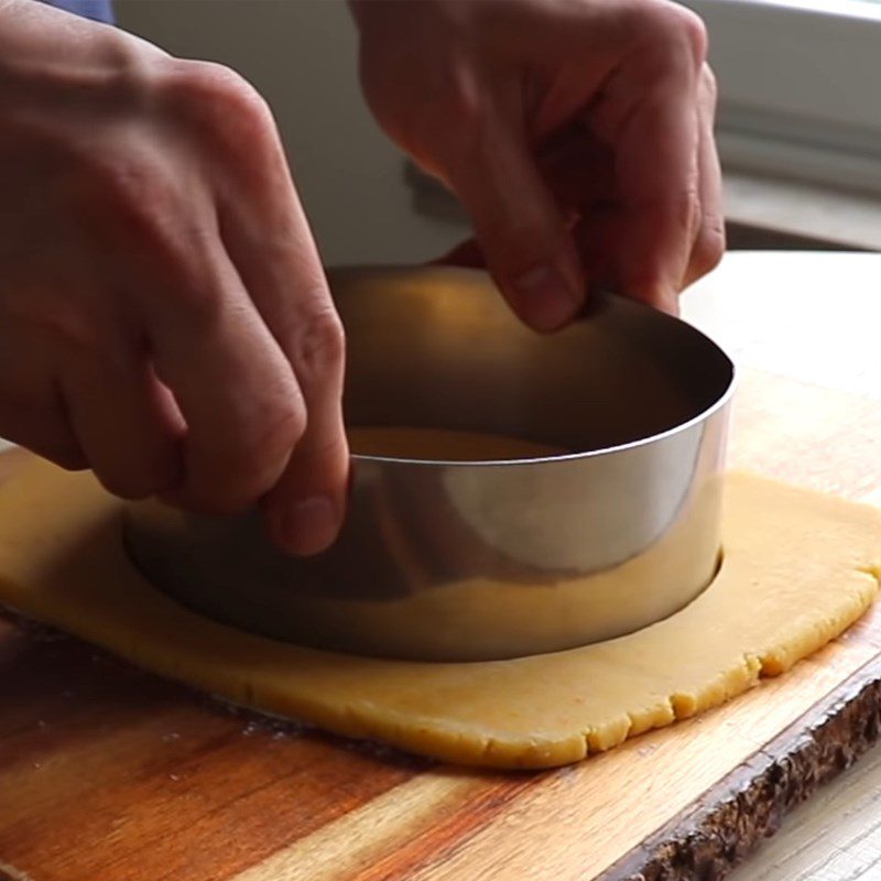 Step 2 Pour into mold and bake the cake base Baked Orange Cheesecake with flour