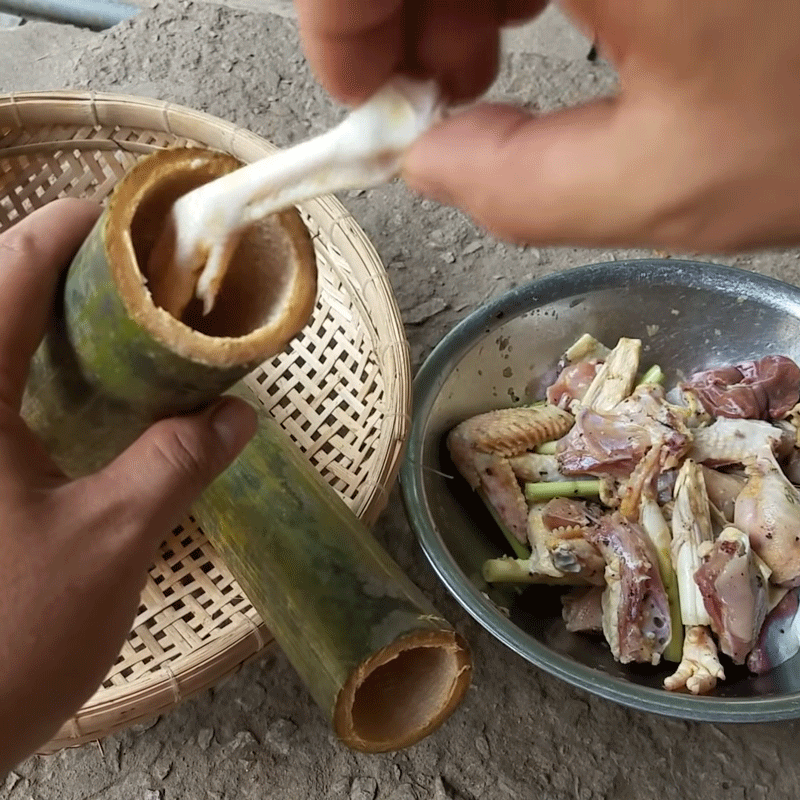 Step 3 Stuff the chicken into the bamboo tube Grilled bamboo tube chicken