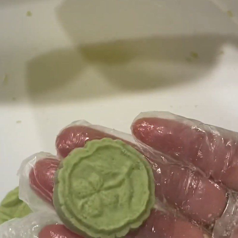 Step 5 Pressing Phuc Linh Cake with Pandan Leaves