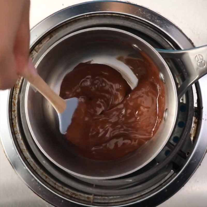 Step 3 Melting chocolate Snowman from marshmallow candy