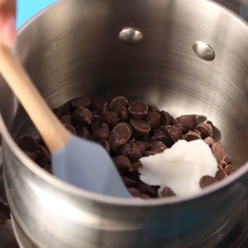 Step 3 Melting chocolate Snowman from marshmallow candy