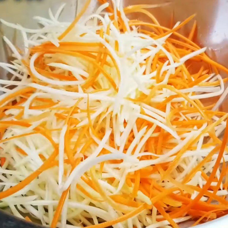 Step 3 Pounding and Mixing Papaya and Carrot Salad