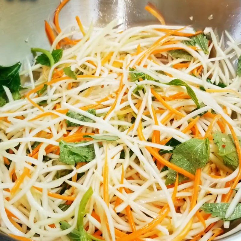 Step 3 Pounding and Mixing Papaya and Carrot Salad