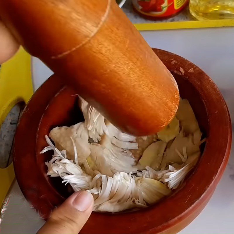 Step 2 Pound young jackfruit Fried young jackfruit