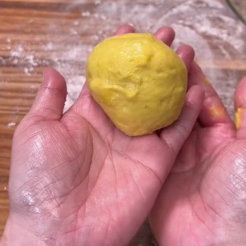 Step 6 Wrapping the buns for pumpkin buns with mung bean filling